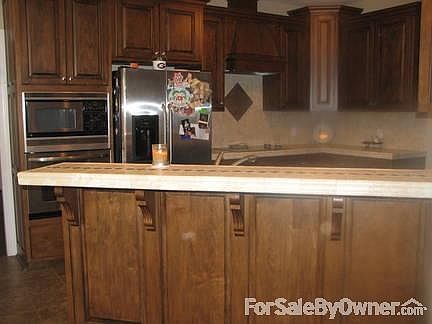 Bar
						:
						Breakfast bar with custom tile counter top