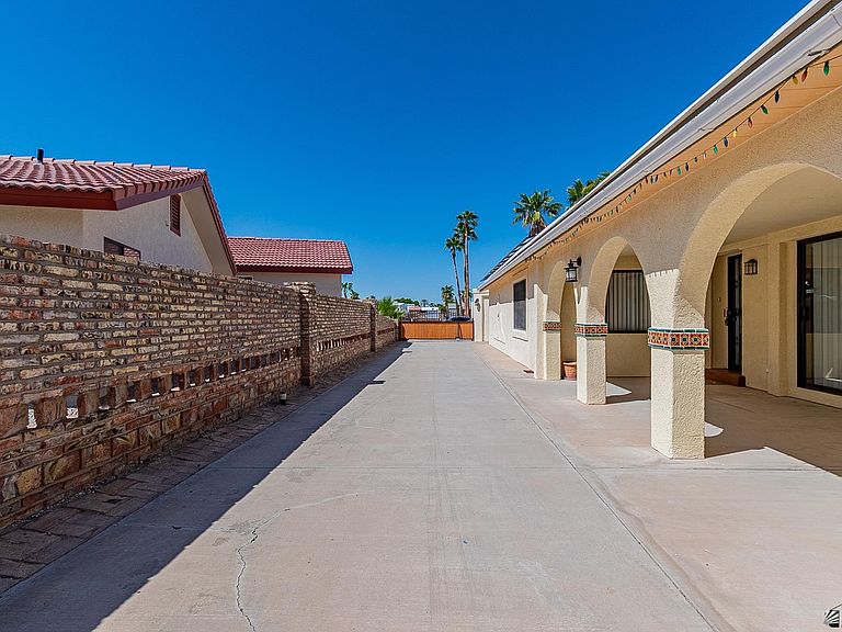 Side yard and arched walkway