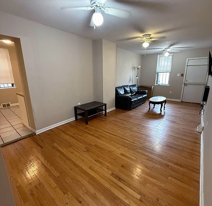 Huge Living Room includes Mounted Electric Fireplace and TV