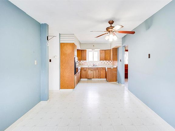 Large dining area and kitchen with lots of cabinets!