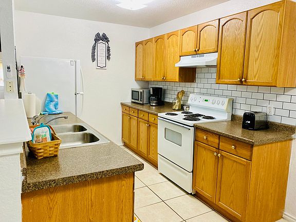Kitchen Includes refrigerator, stove and dishwasher.