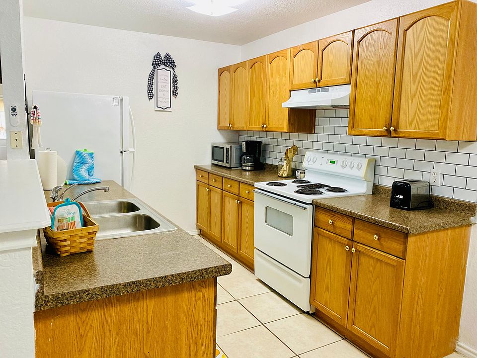 Kitchen Includes refrigerator, stove and dishwasher.