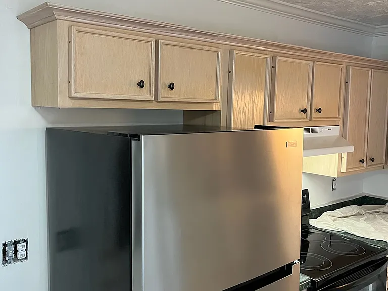 Fresh Paint in the Kitchen along with some new appliances like the refrigerator/freezer and new dishwasher.