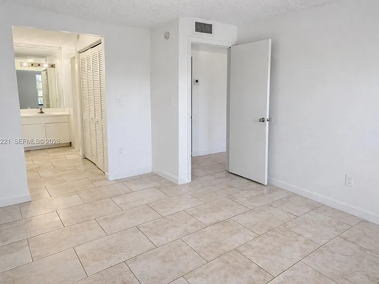 1755 W 60th St #D212 — Photo 16