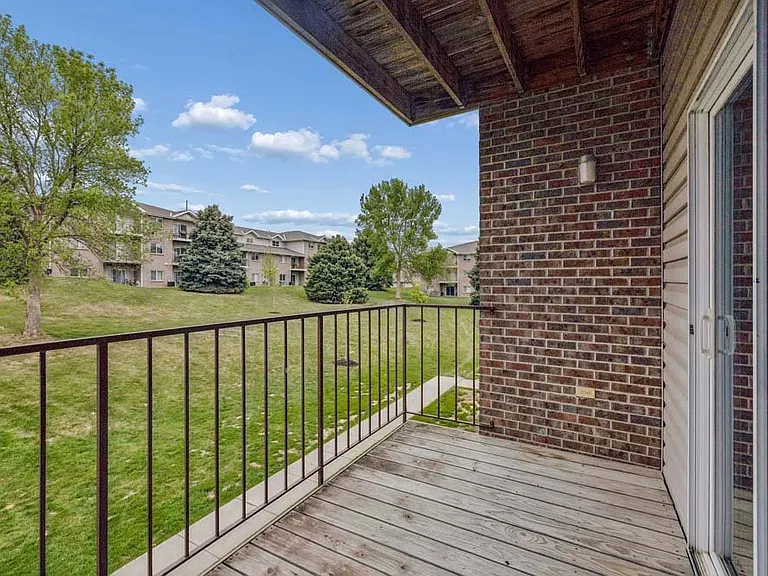 Enjoy a private balcony overlooking green open space, offering a relaxing outdoor retreat just steps from your living area.