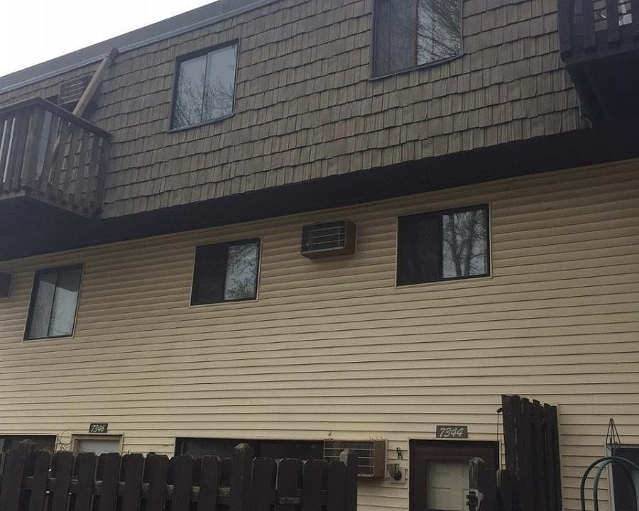 7344 Front with Fence and Patio
