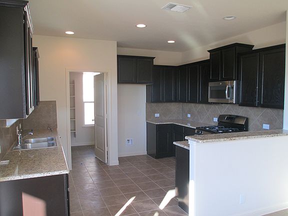 Large kitchen, with upgraded cabinets, granite counters and