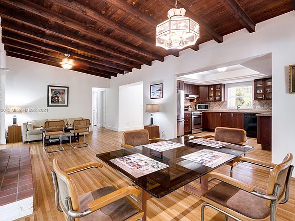And now you see the access to the kitchen from the Livingroom/Dining area and the Familyroom is adjacent to the kitchen! The wide opening to the left of the kitchen is the Foyer entry leading to the front door. 