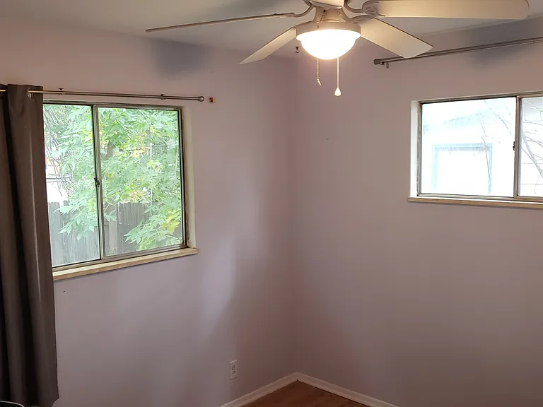 Windows face East & South. Often used as a "Study". Each BR has hardwood floors & closet.