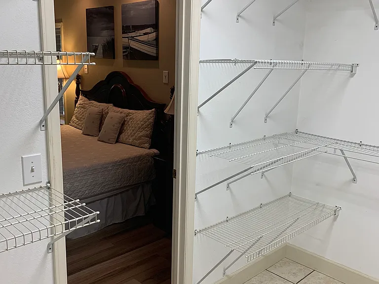 Large walk-in closet provides lots of storage.