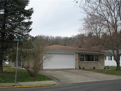 Driveway with a two car garage for entrance to a very spacious home...
