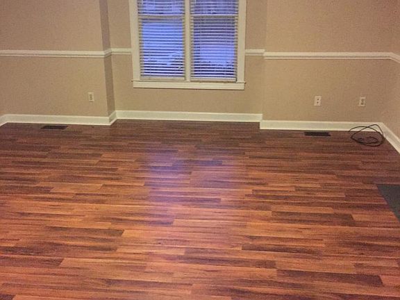 Wood-look floors in large den