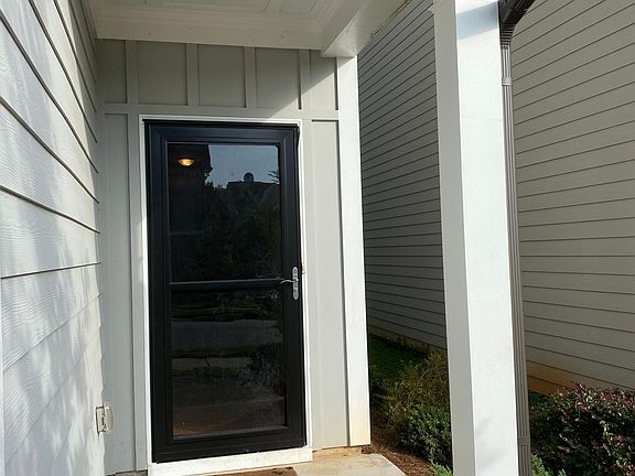 The front door of the house (with storm door)