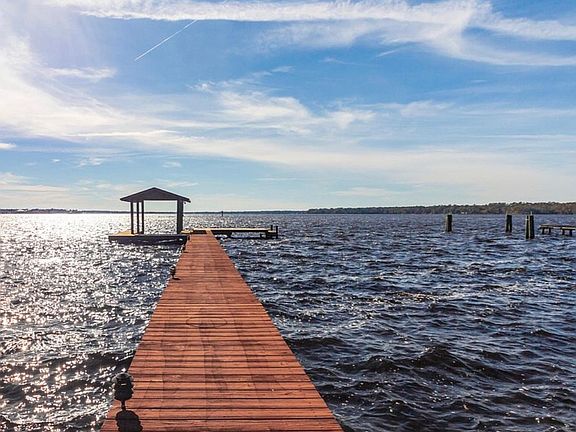 Dock and boathouse with lift