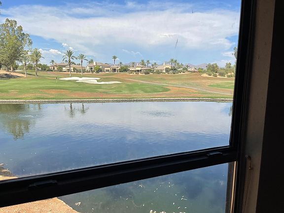 The view from the entrance foyer. The foyer leads to the stairs up to the living area of the unit. The foyer also leads to the two car garage. This foyer is large enough for an in home office and boasts great views out of two different windows.