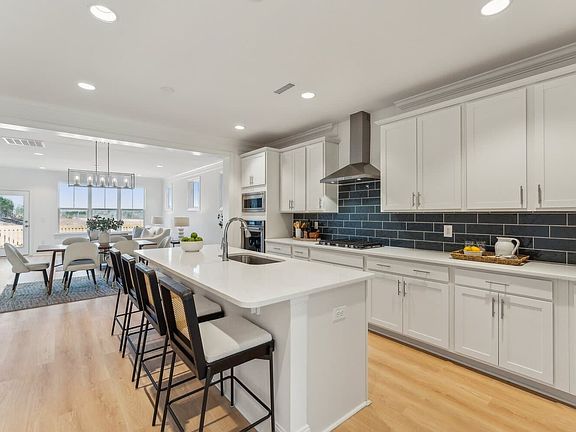 The kitchen of the Declan single family home by Brookfield Residential at Wendell Falls.