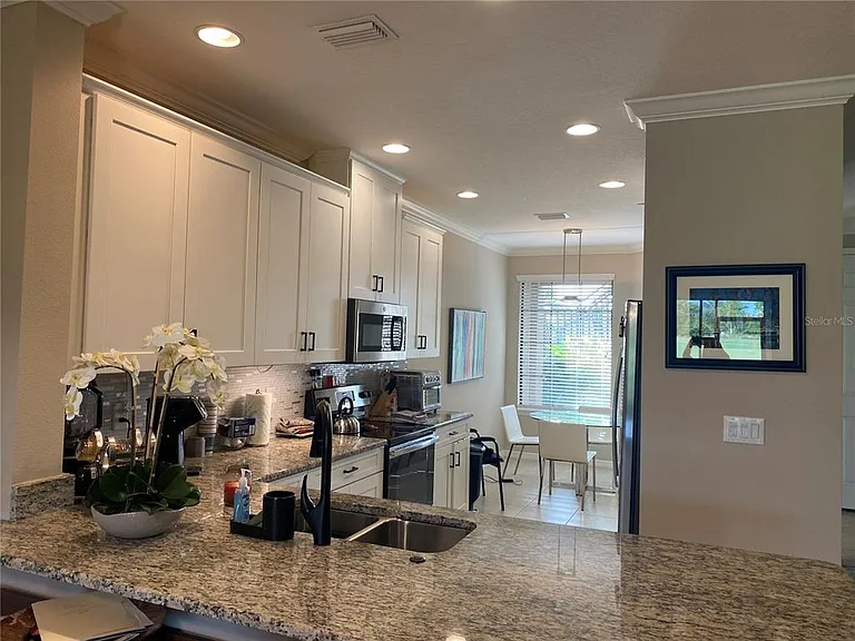 12730 Sorrento Way #103 — Photo 8