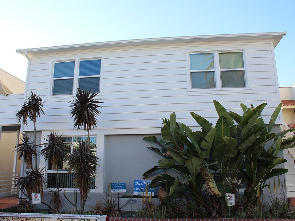 Front of Building. One bedroom units have front and back doors