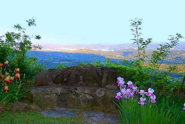 Rock bench with views of the city.
