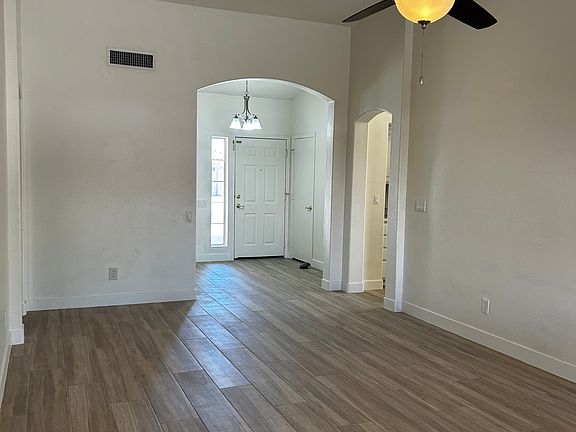 Great Room with Recessed Lights and Ceiling Fan