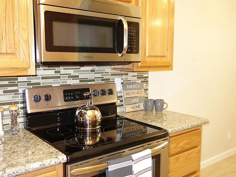 Modern Kitchen with Stainless Steel Appliance Package