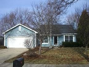 2 car garage and professionally landscaped