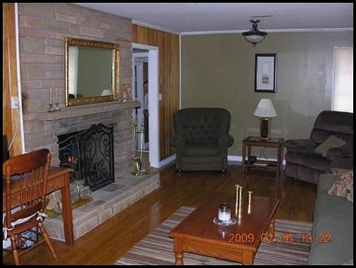 Spacious Living Room with wood Burning Fireplace