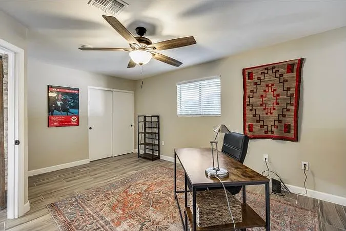 10932 W Tropicana Cir — Photo 16