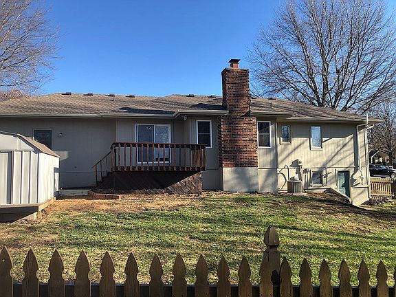 Back side of house w/ fenced