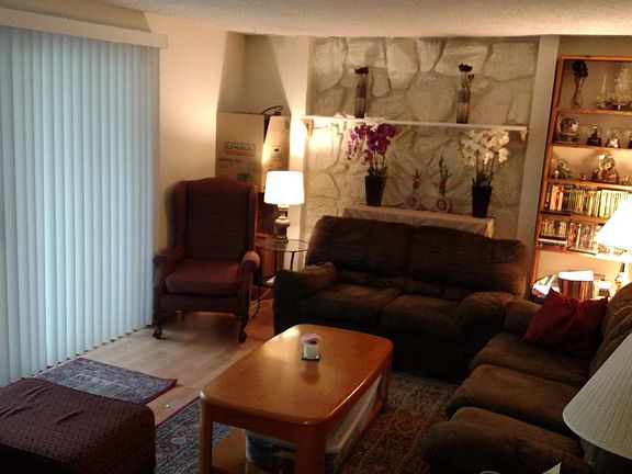 Living area, fireplace is behind couch.  They choose not to 