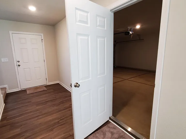 Entry to 2-Car Attached Garage from the Hall way