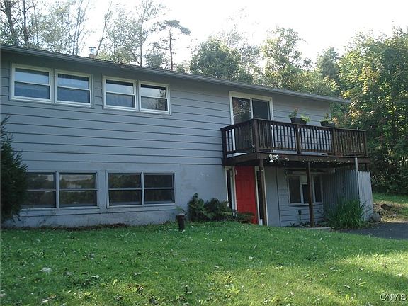 Front with deck off of the living room