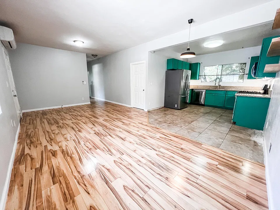 Open floorplan from living room to kitchen.