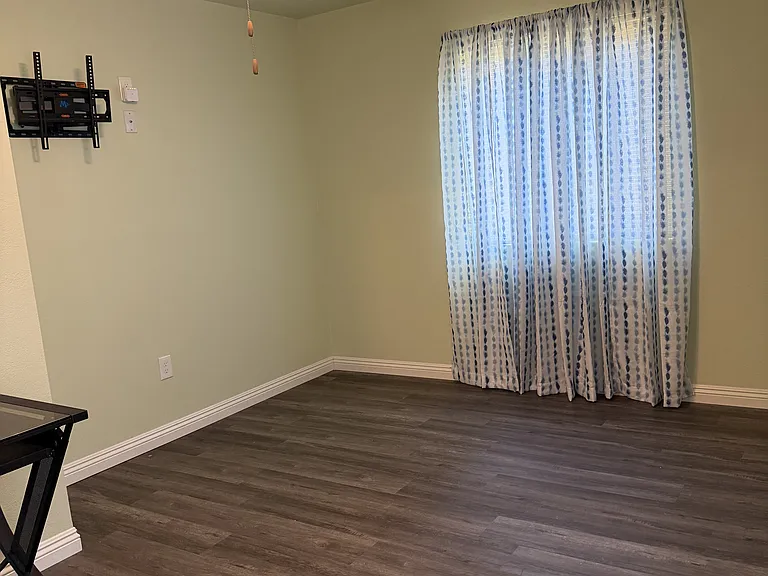 Bedroom #1 (mid room view) with wall tv mount included