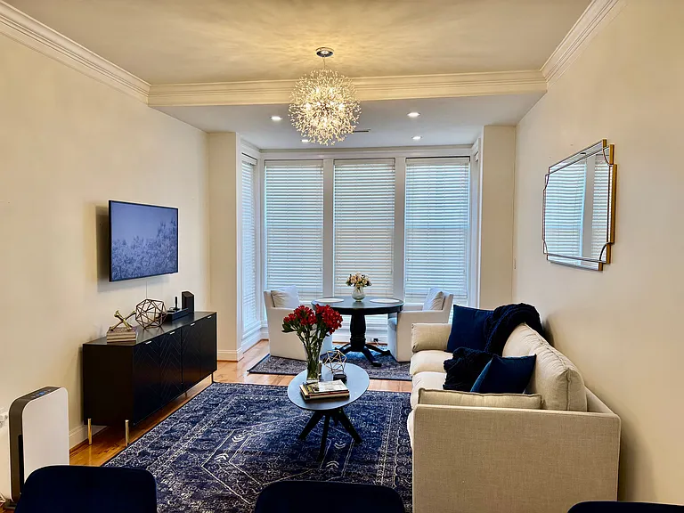 Living Room w/ New Crystal Sputnik Lighting w/ Dimmable Switch.