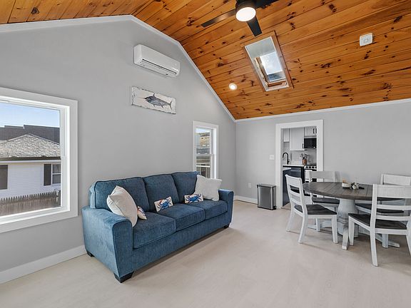 Comfortable seating with a minisplit for heating/cooling and a table for four.