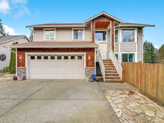 Large Lot at 10,019 - the entire private Drive-Way is yours.  There is a neighboring 2-story that has access but the drive way would be yours - park extra vehicles along it - plus there is street parking. 