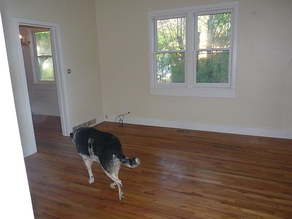 Living room leading to eat-in kitchen