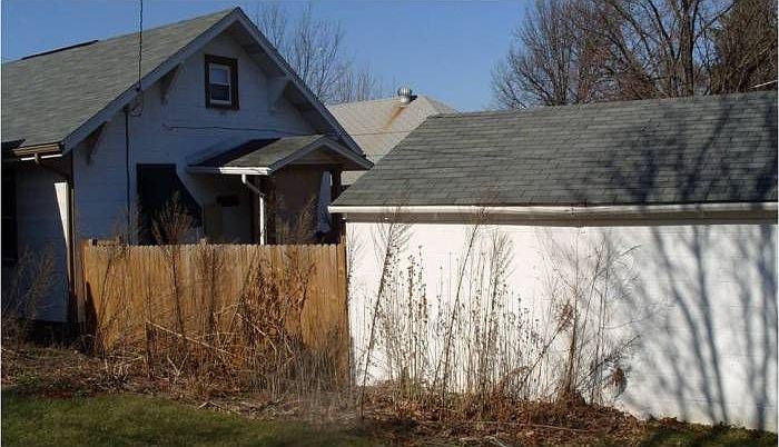 Fenced in yard and garage