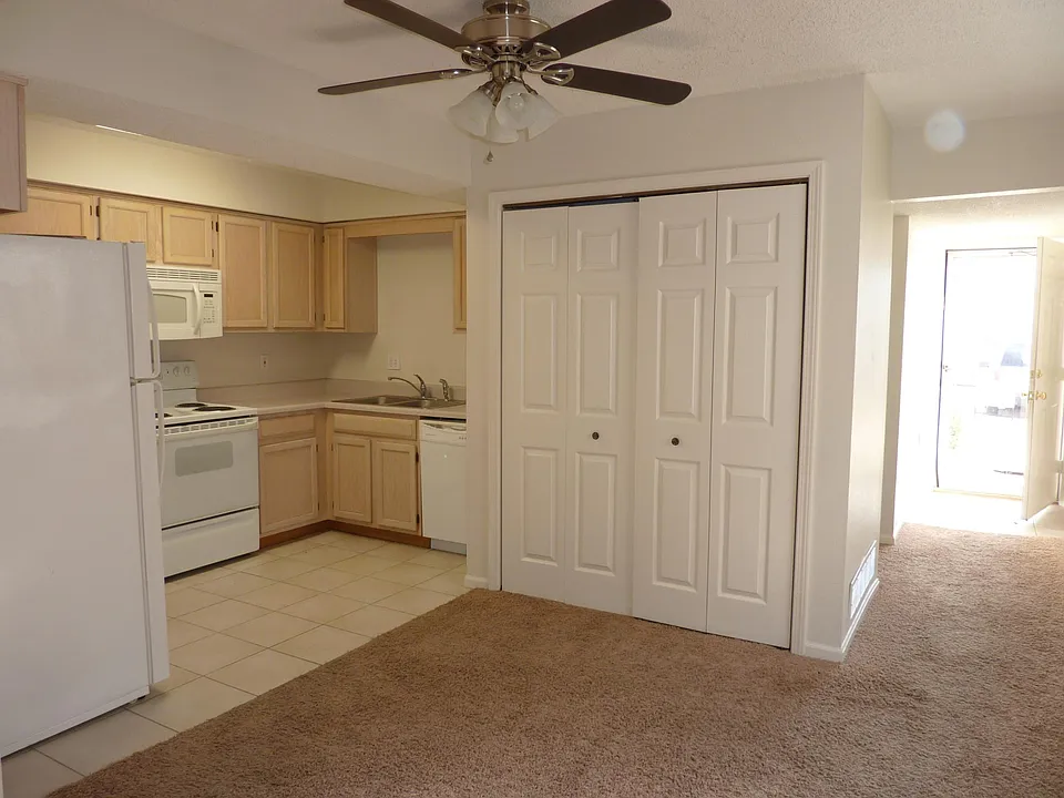 kitchen and dining area with laundry hook ups
