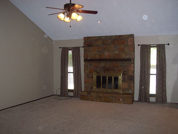 Living Room with wood burning Fireplace