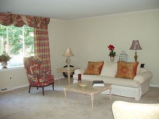 Freshly Painted & Newly Carpeted Living Room