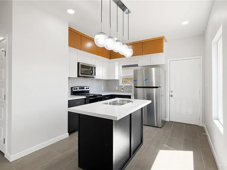 1003 Sugar Garden Ave — Photo 4