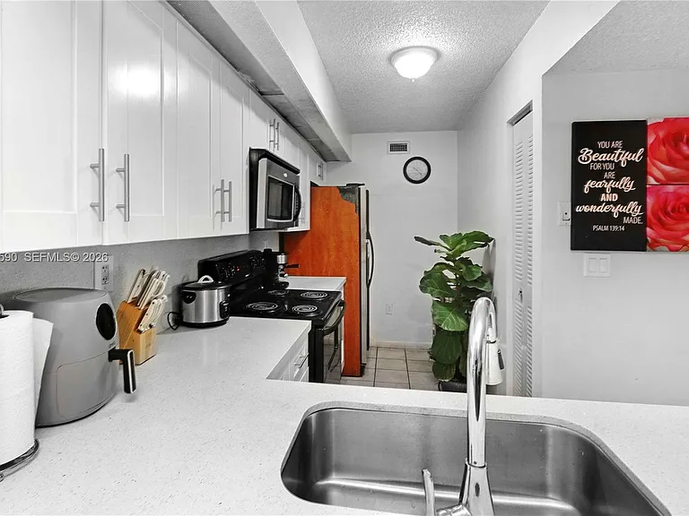 8640 SW 212th St #303 — Photo 16