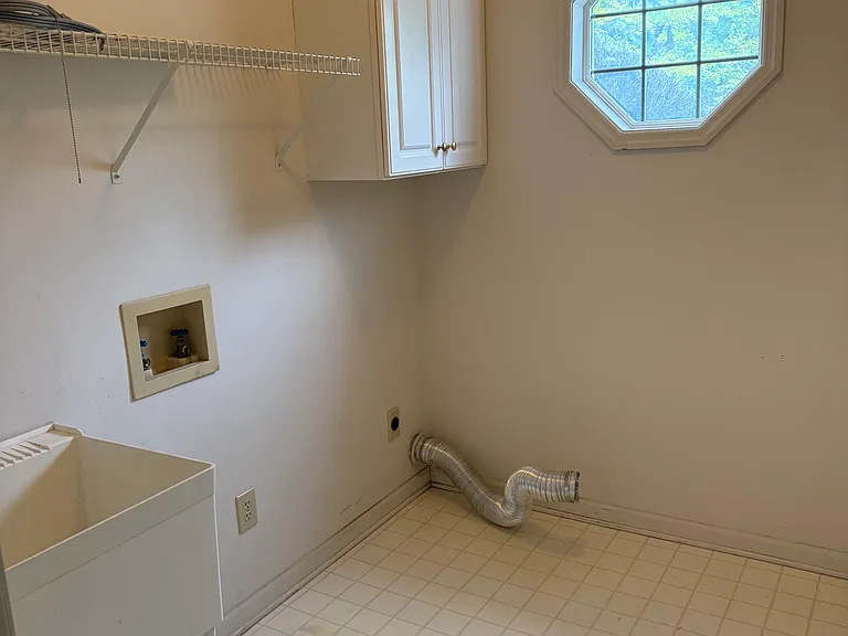 laundry room with wash sink