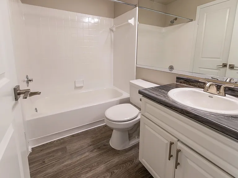 Immerse yourself in opulence with The View's elegant bathroomsequipped with granite-style countertops and expansive mirrors, creating the ultimate retreat for your daily pampering.
