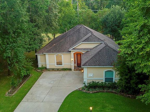 Quality built stucco home close to the park and west gate.