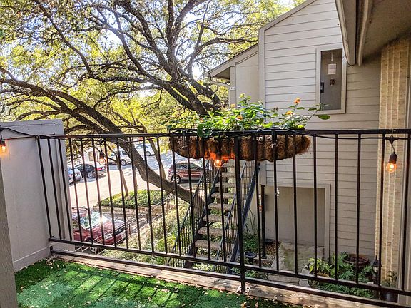 The patio is well shaded under beautiful trees and has a gre