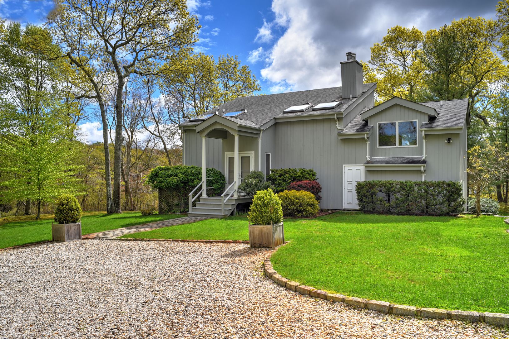  Take Driveway down Flag Lot to 2 Story Renovated Home Surrounded by Specimen Trees 