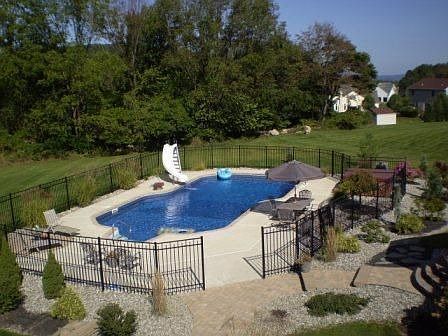 Pool area with hot tub